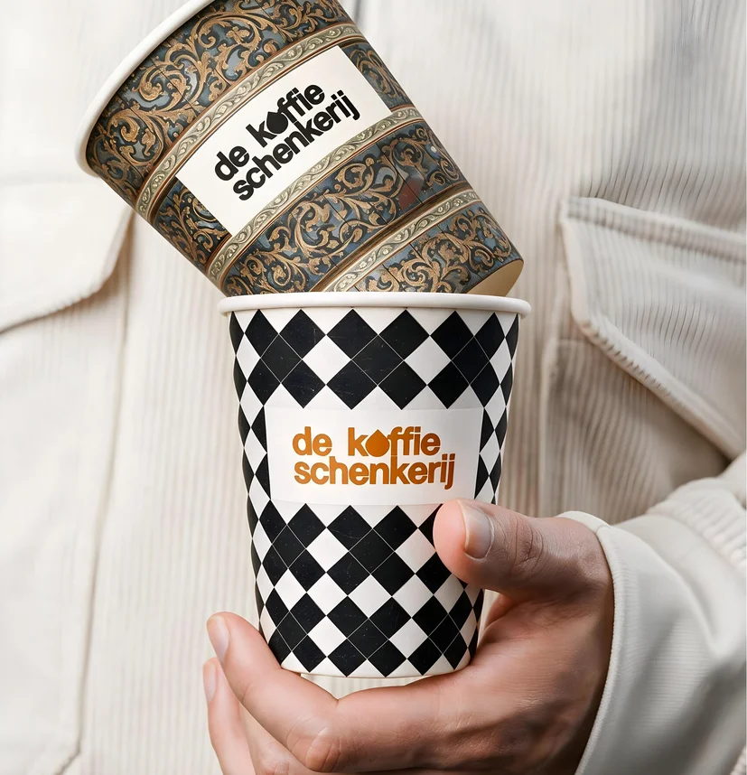Two cups held against a white knit sleeve