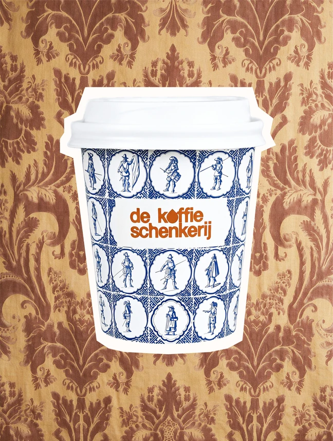Delft tile cup against a brown damask wallcovering