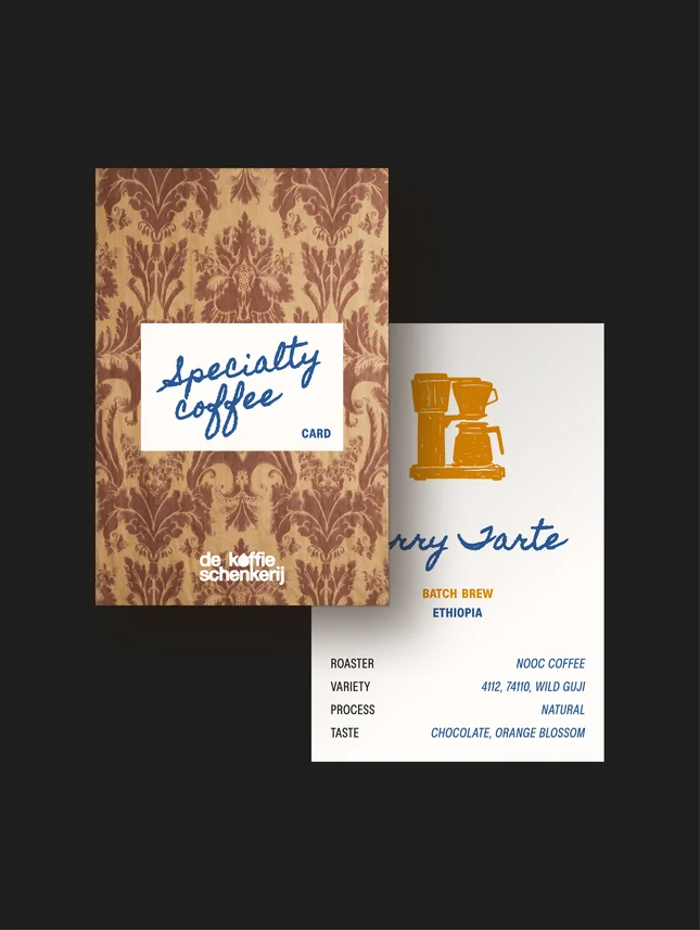 Specialty coffee packaging and cards on a dark ground