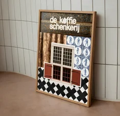 A framed poster leaning against a tiled wall